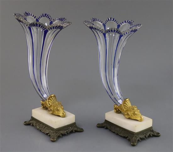 A pair of Bohemian blue flashed glass cornucopia vases, 19th century, H. 16.5 and 17cm